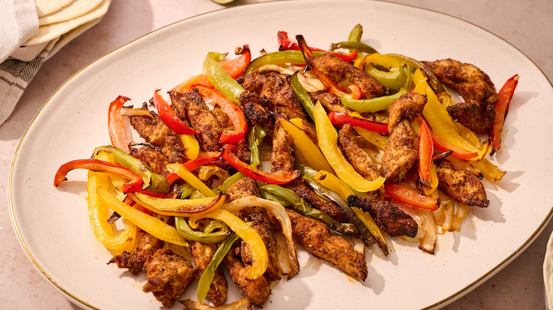 chicken fajitas on platter