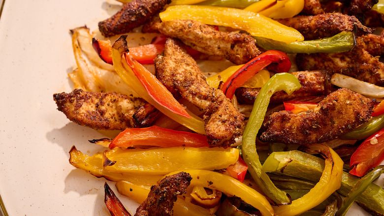 chicken and peppers on platter