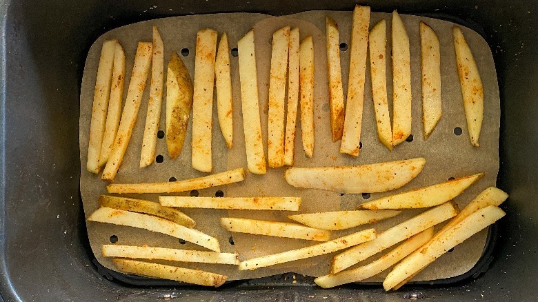 french fries in air fryer basket