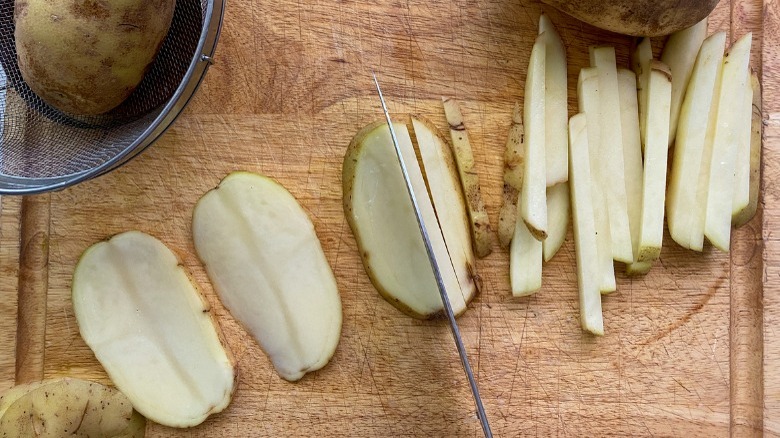 potatoes sliced into fries