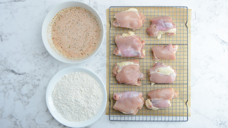 uncooked chicken on rack 