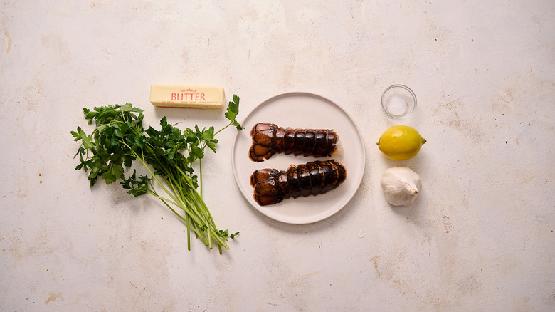 Ingredients for lobster tails on table