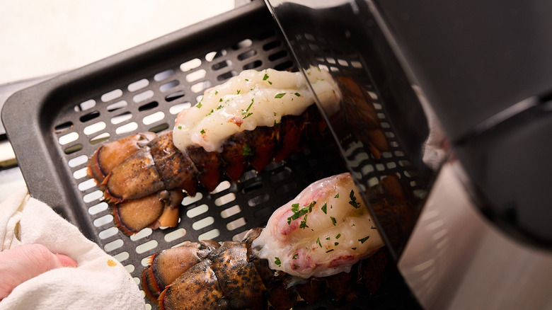 sliding lobster tails into air fryer