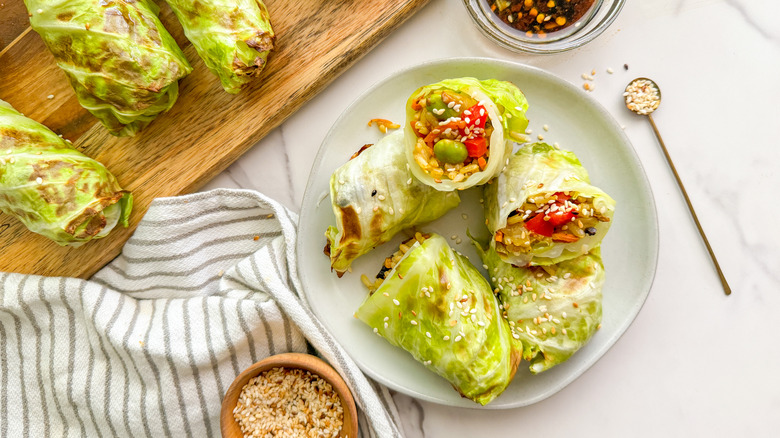 plate with cut cabbage rolls