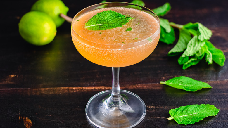 Traditional Air Mail Cuban cocktail with lime and mint