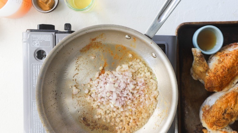 Shallots cooking in saute pan