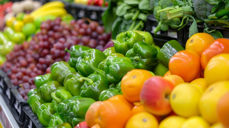 Variety of fruits and vegetables inside grocery store