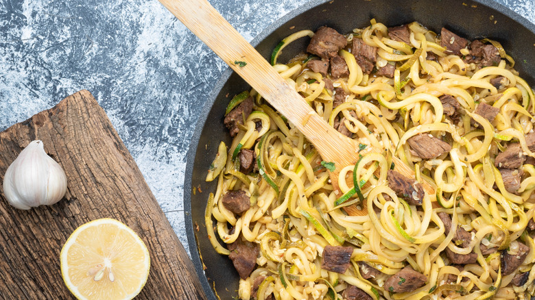 Steak and zoodles in a pan