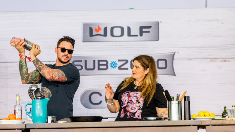 Gabriele Bertaccini and Alex Guarnaschelli doing cooking demo