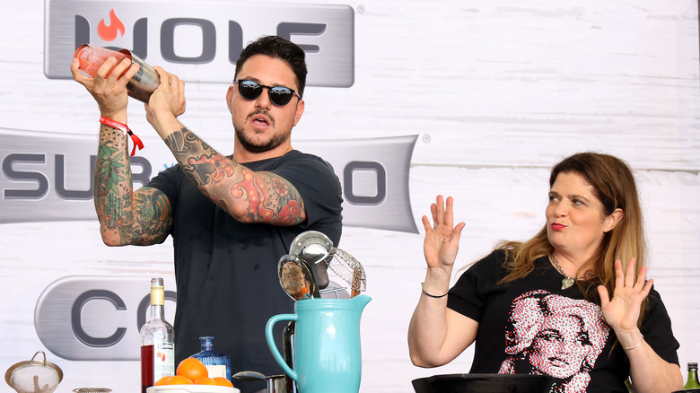 Alex Guarnaschelli and Gabriele Bertaccini cooking during demonstration