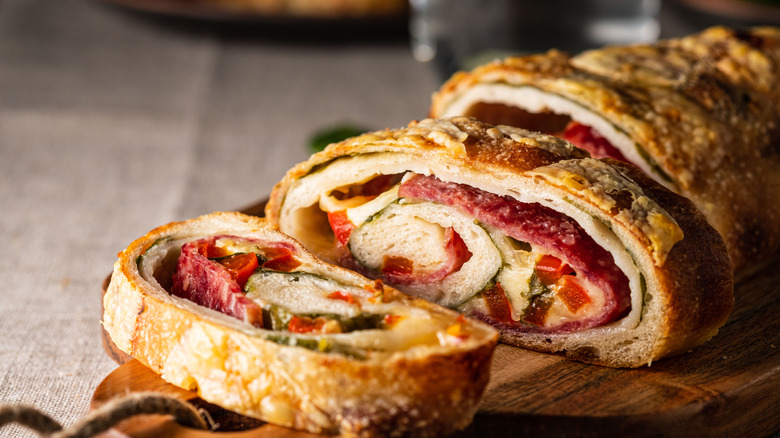 Sliced stromboli with meat and vegetables