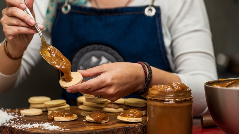 Woman making alfajores