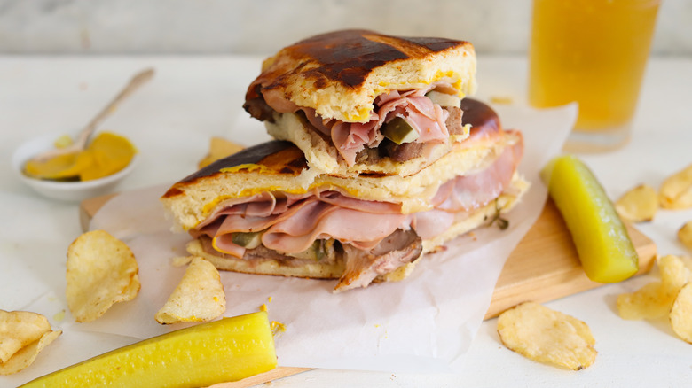 stacked Cuban sandwich with pickles