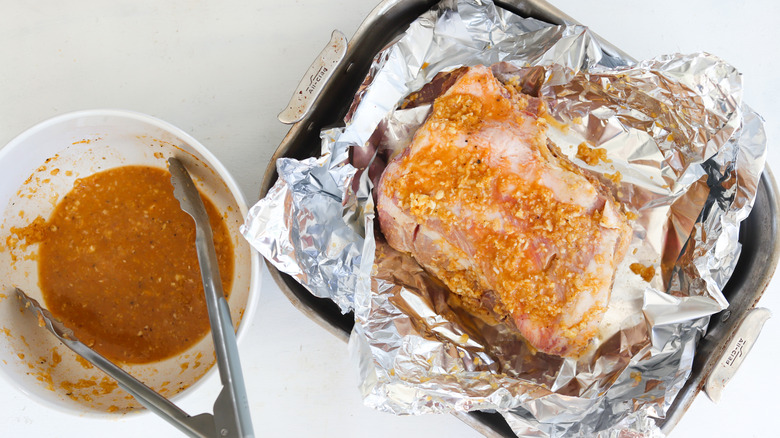 marinated pork in lined pan