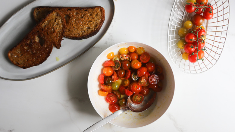 Tomatoes marinating in bowl