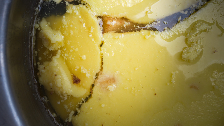 Chicken stock with solidified fat layer