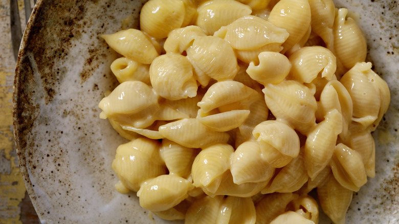 Shells with butter, eggs, and cheese