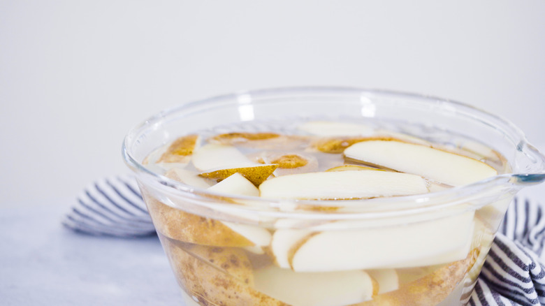 Potatoes soaking in water 