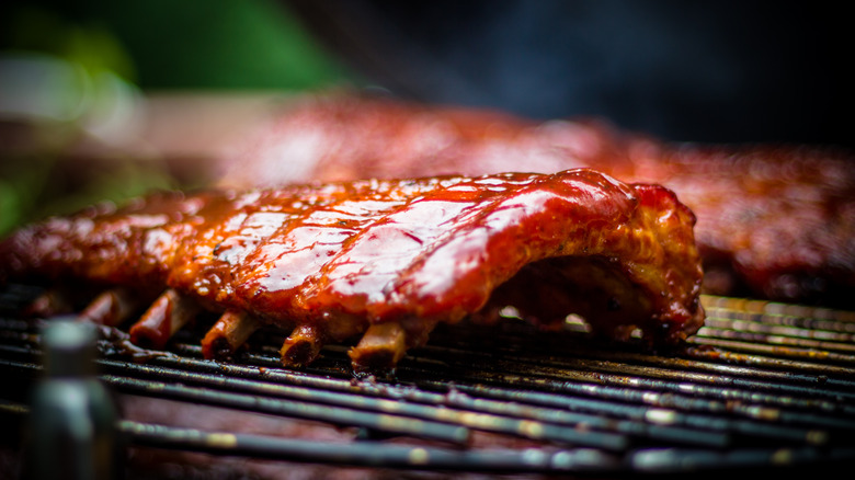 Baby back ribs on a grill