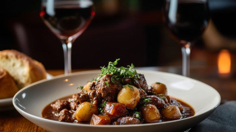 beef stew served with wine