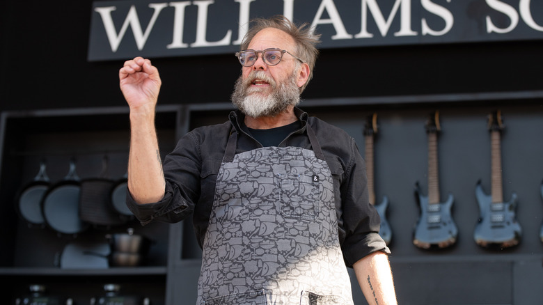 Alton Brown speaking at event