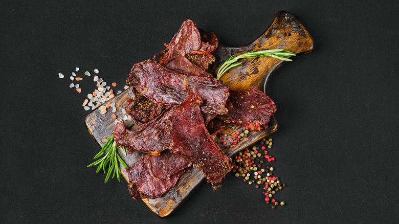 cutting board with beef jerky