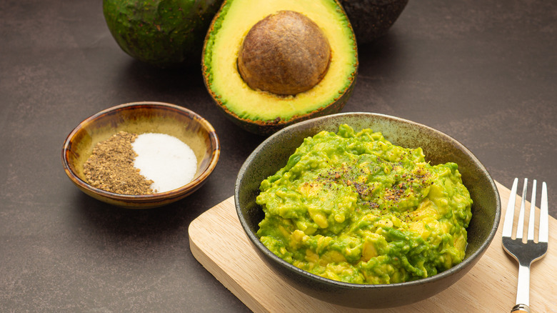 avocado guacamole salt fork