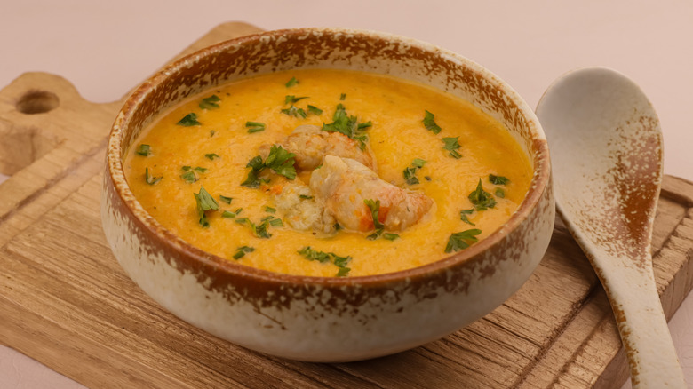 A bowl of lobster bisque ready to eat