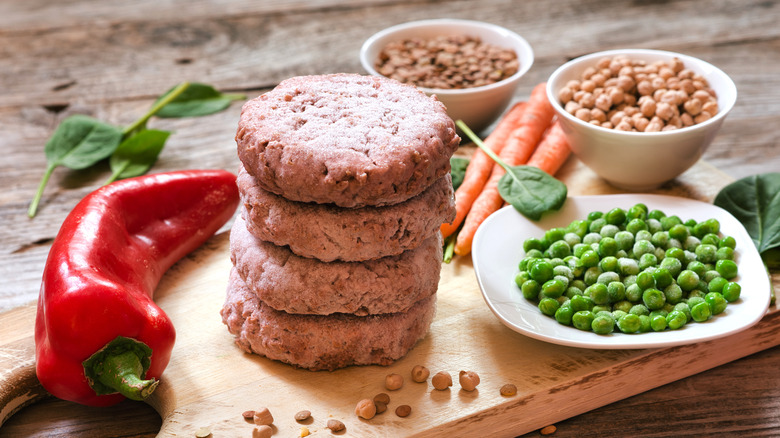 Veggie burger patties with vegetables