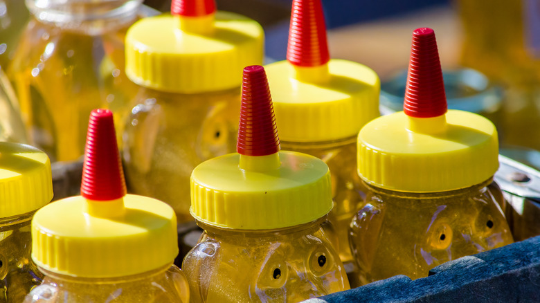 honey bear bottles in crate