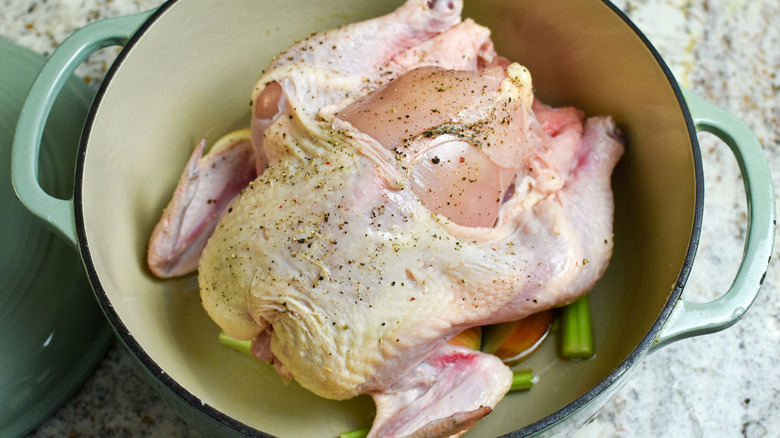 raw chicken in pot