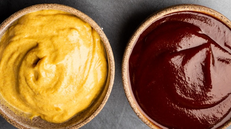 Mustard and barbecue sauce bowls