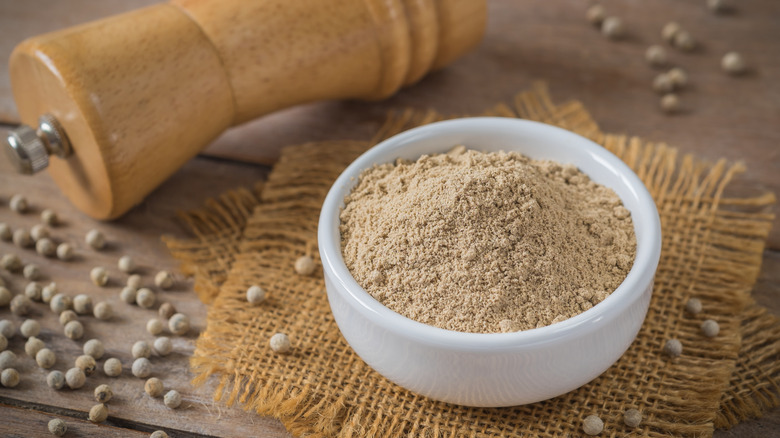 white pepper in a bowl and shaker