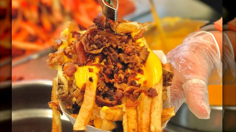 Fries with cheese sauce and bacon