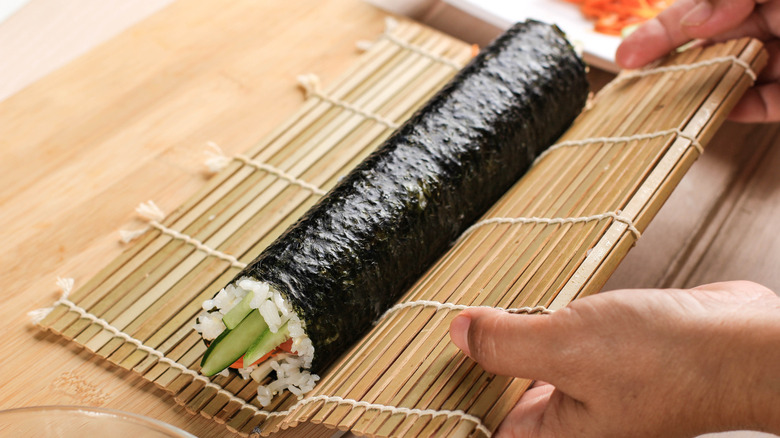 Kimbap rolled with rolling mat 