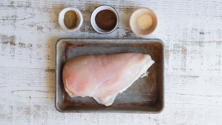 raw chicken with spices