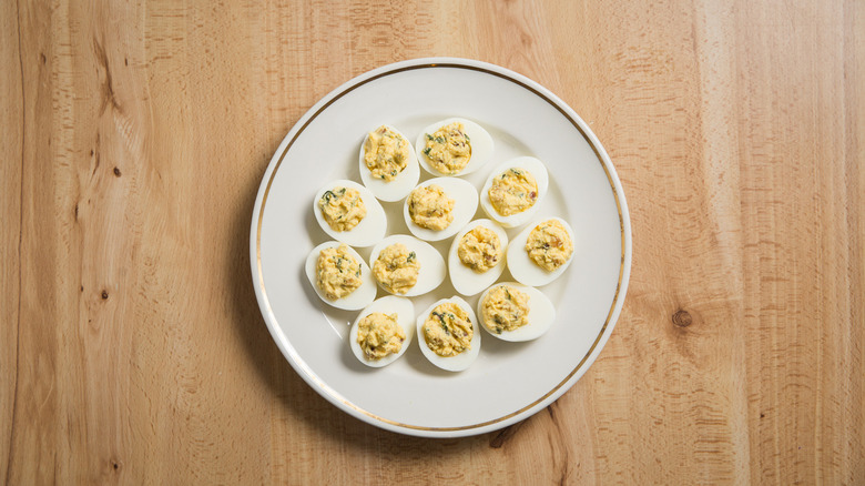 12 deviled eggs on plate 