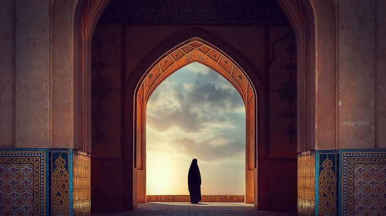 Silhouette of a Persian woman in mosque 