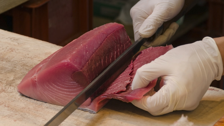 filleting a tuna fish