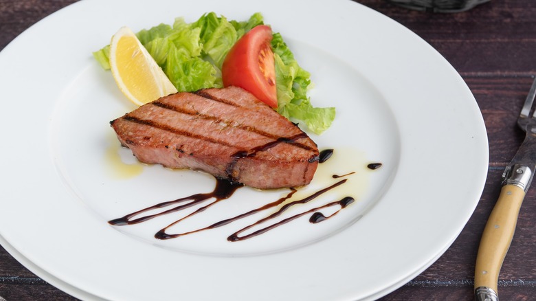 grilled tuna steak on plate