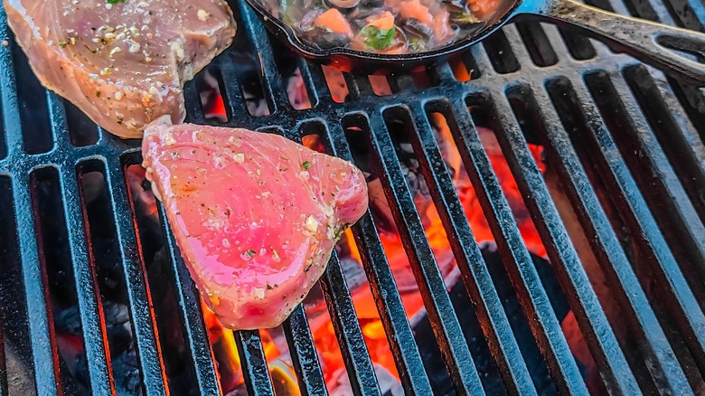 tuna steak on grill grate