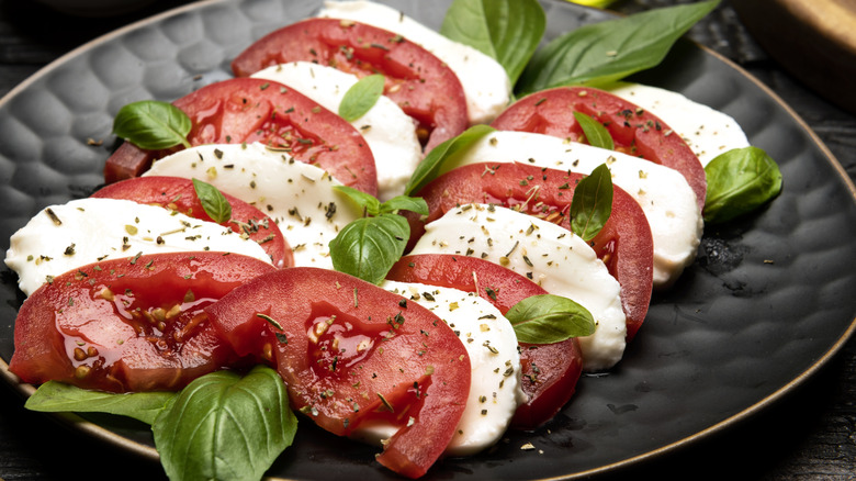 tomato and mozzarella on plate