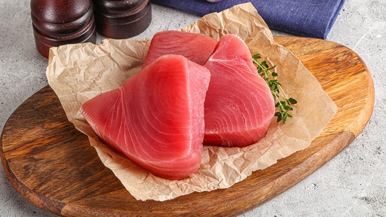 fresh tuna steaks on board