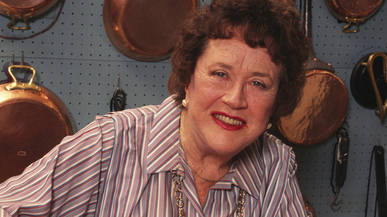 Julia Child in front of pans