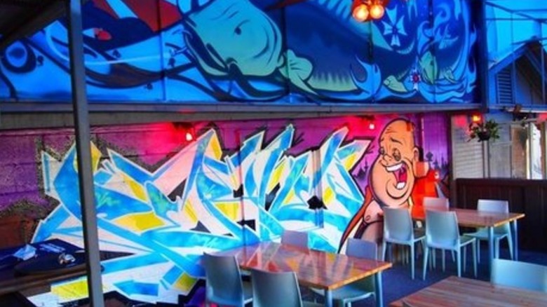 Octopus Bar tables with graffiti-style mural