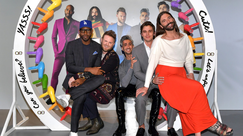 Queer Eye cast posing at event