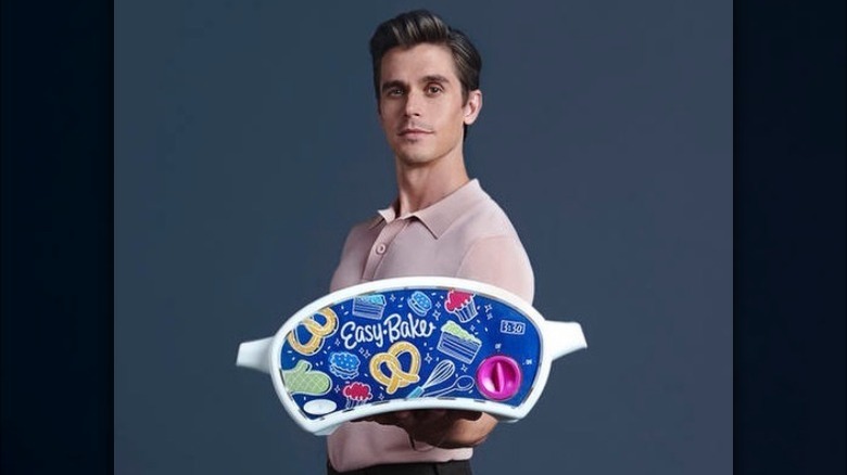 Antoni Porowski holding Easy-Bake Oven