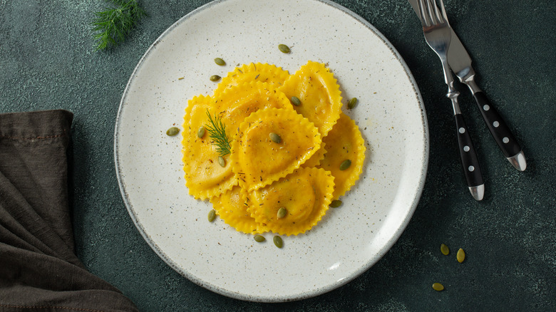 sqaush ravioli on plate