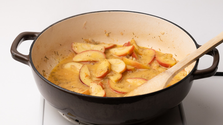 simmering apples in sauce