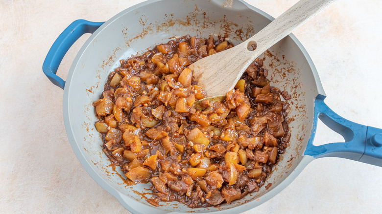 apple chutney simmering on stove